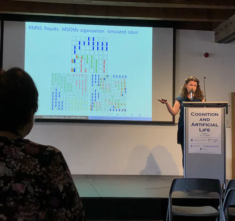 Kristína Malinovská presents at the Cognition and Artificial Life conference