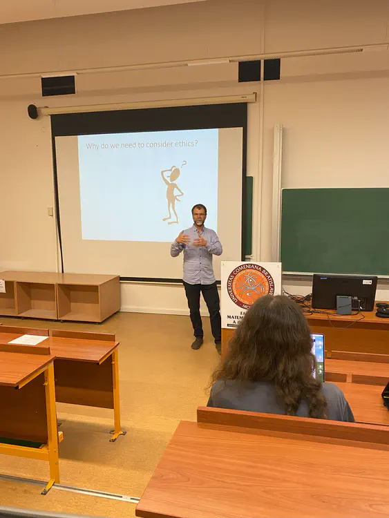 Martin Takáč presents during a workshop. A presentation slide reads: "Why do we need to consider ethics?"